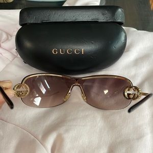 Gold Gucci sunglasses